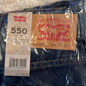Levi’s 550 relax cut adjustable waist band 10 slims 23 W. 25 length.